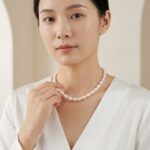 Necklaces AAA Grade Rice-Shaped Oval Freshwater Pearl Necklace with Silver Clasp